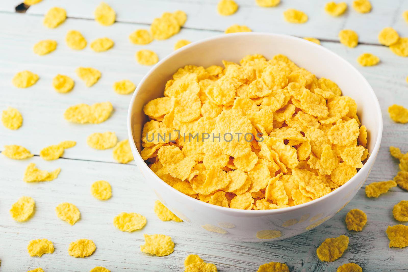 White bowl of corn flakes by Seva_blsv