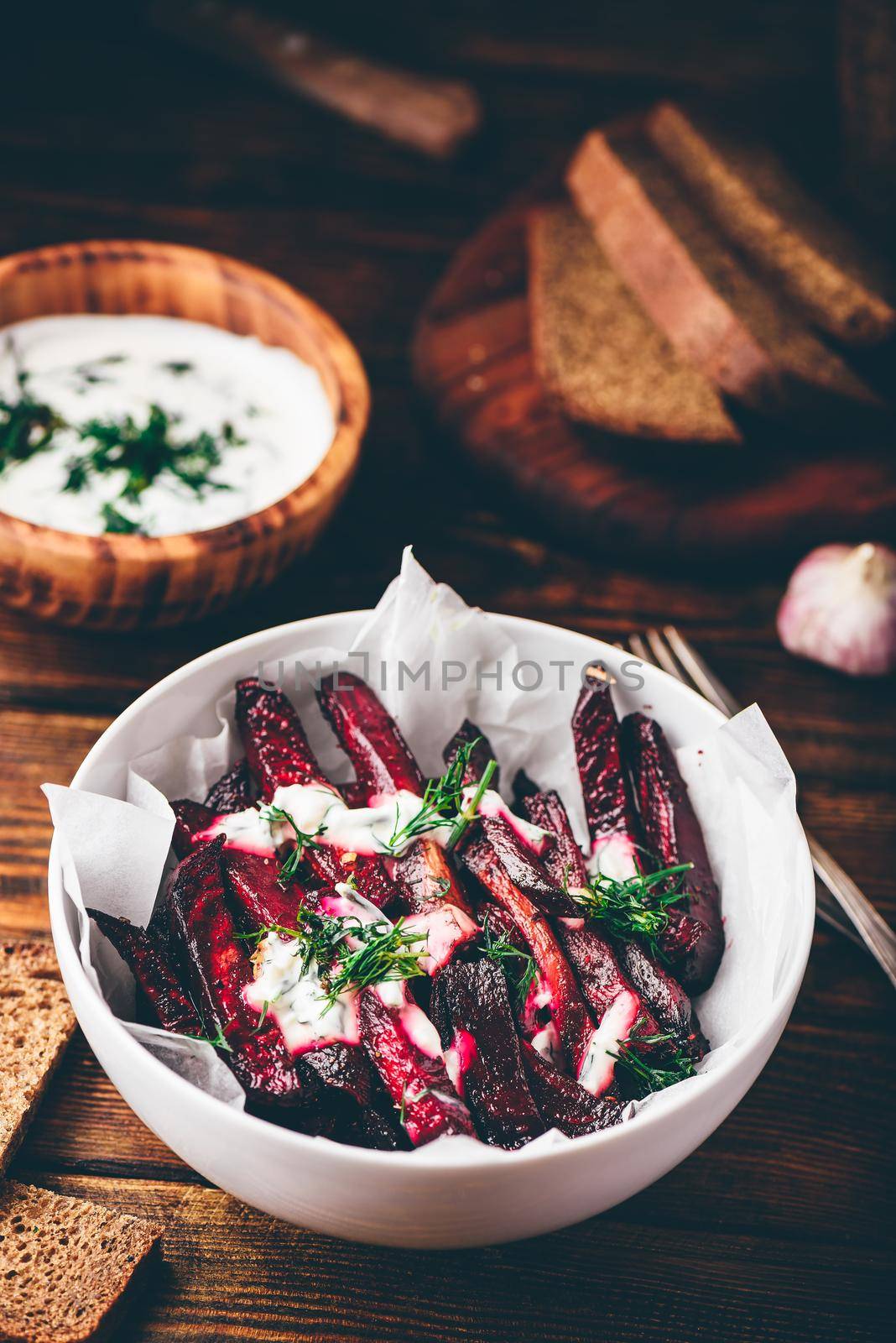 Oven baked beet fries with greek yogurt and dill dressing