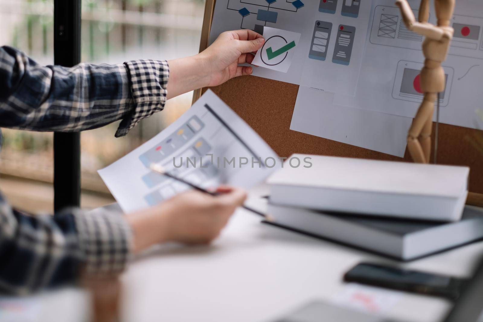 Designer woman drawing website ux app development at home office. User experience concept.