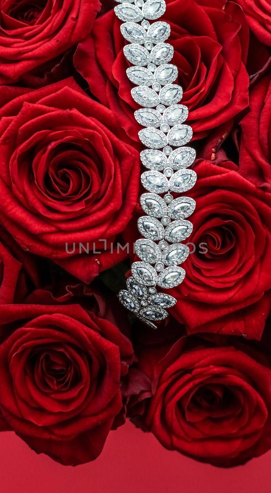 Gemstone jewellery, wedding fashion and luxe shopping concept - Luxury diamond bracelet and bouquet of red roses, jewelry love gift on Valentines Day and romantic holidays present