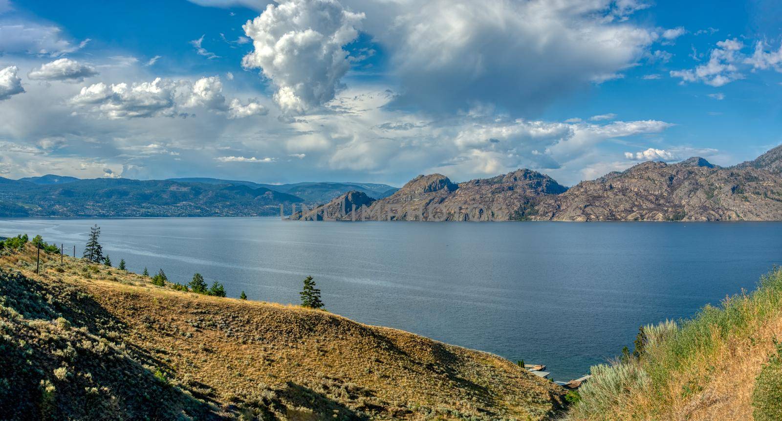 Panoramic view over Okanagan lake on a summer day in Canada.