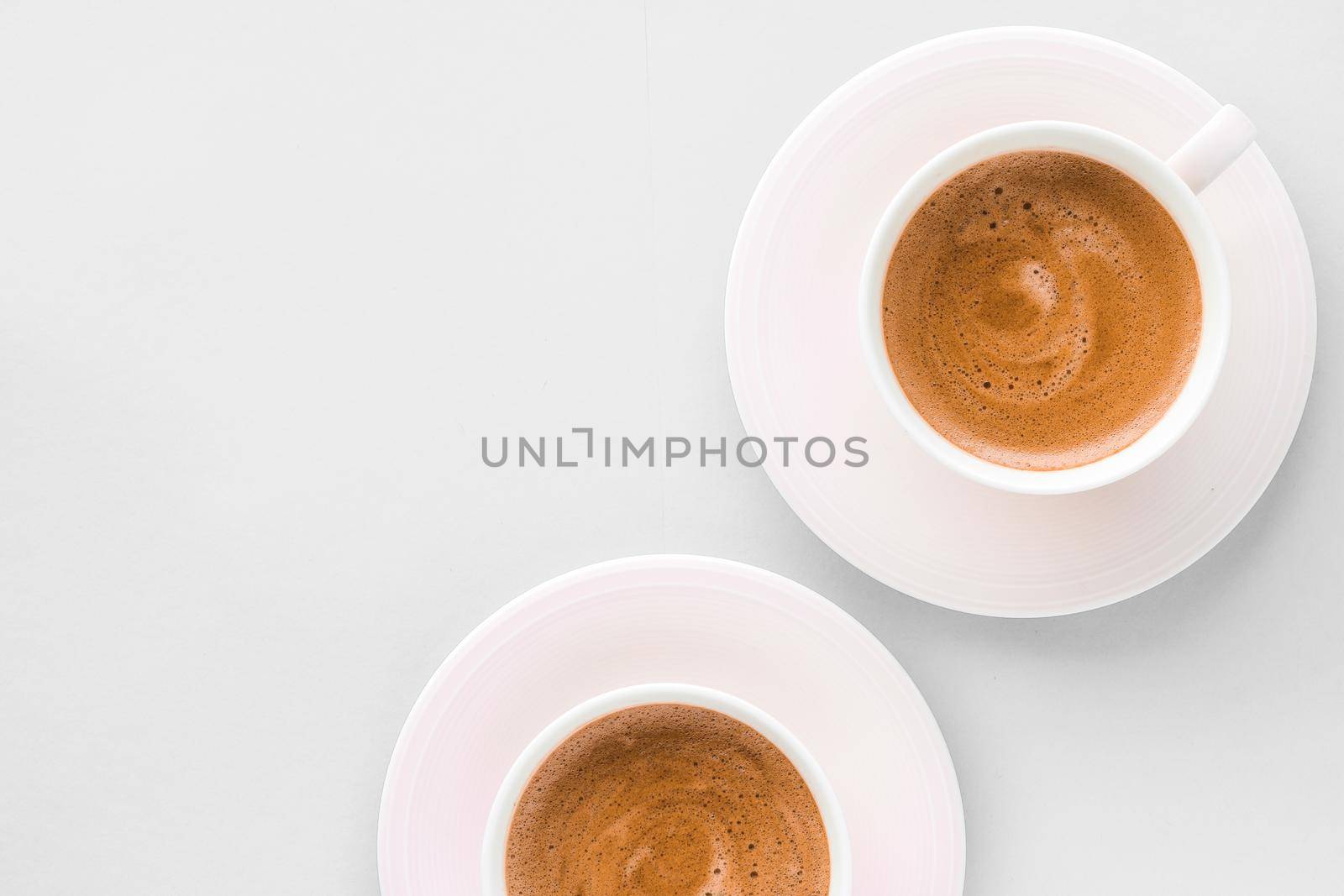 Cup of hot french coffee as breakfast drink, flatlay cups on white background by Anneleven