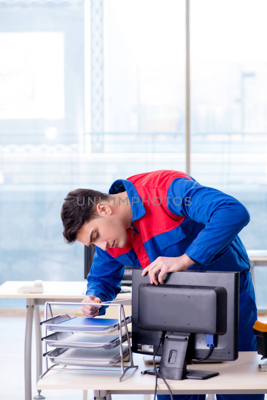 Computer repairman specialist repairing computer desktop
