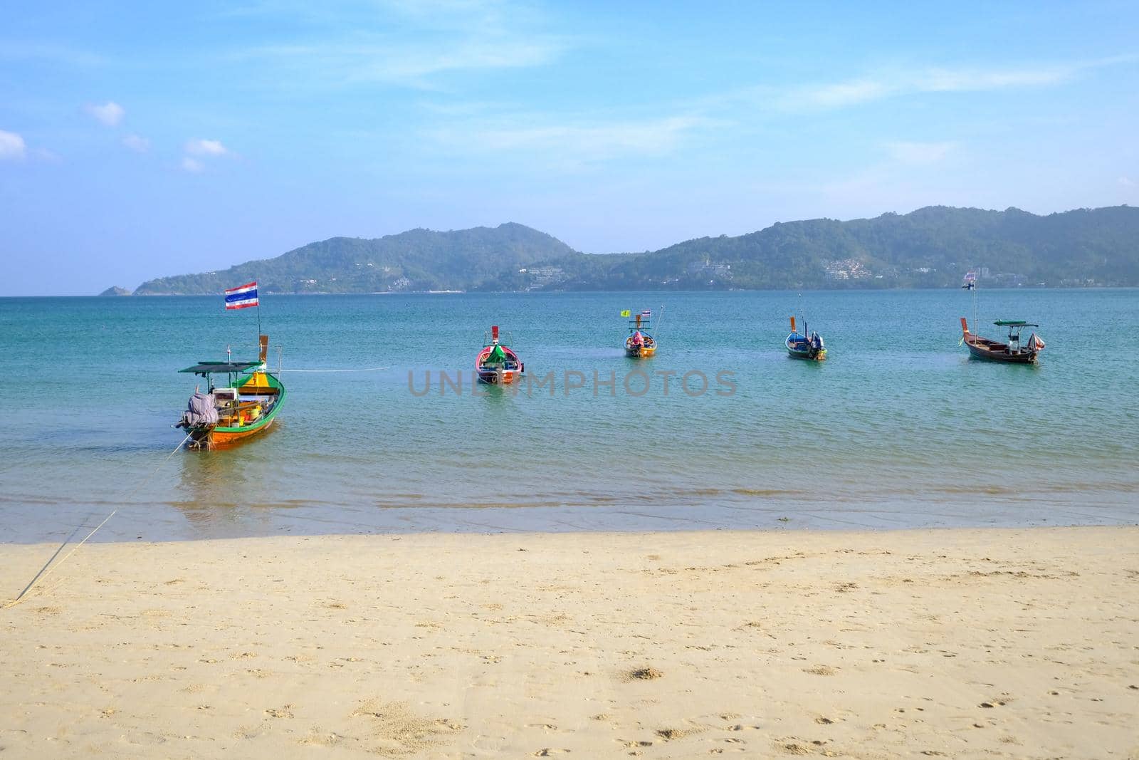 Fishing boat moored at beach Phuket Thailand