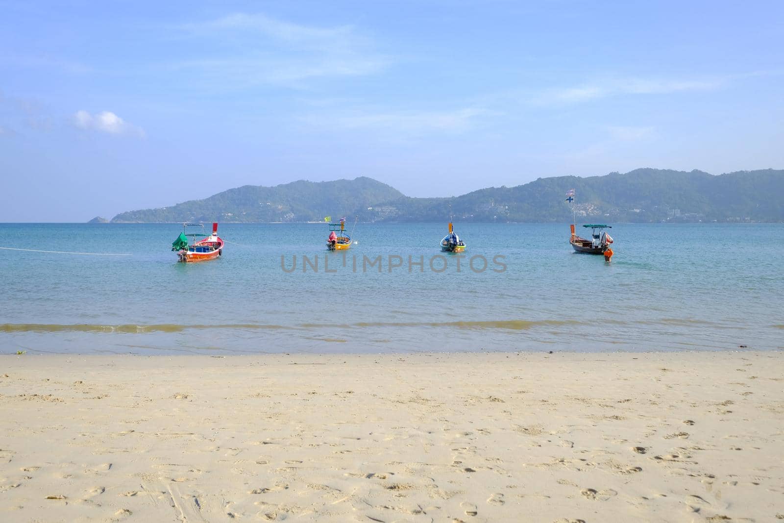 Fishing boat moored at beach Phuket Thailand