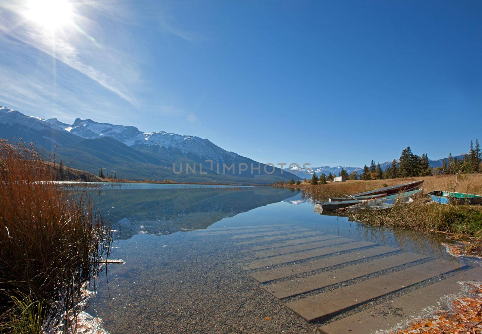 a boat launch and small rowboats beside talbot lake in Jasper National Park, Alberta