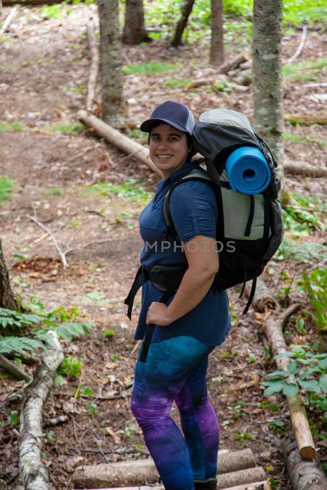  independent woman heading out on a trip in the woods 