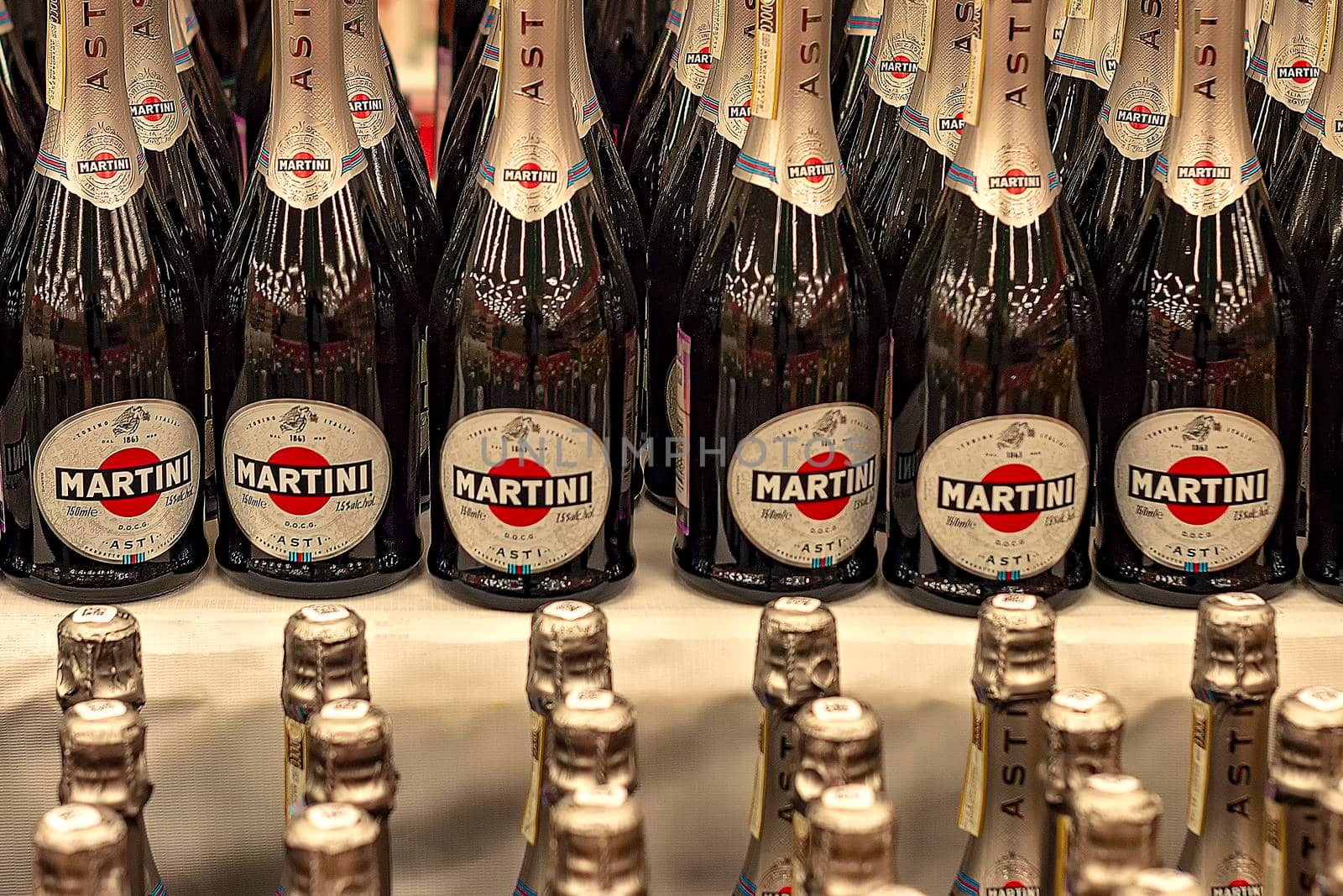 Rows of bottles of Asti Martini bottles in store. Surgut, Russia - 25 December, 2019