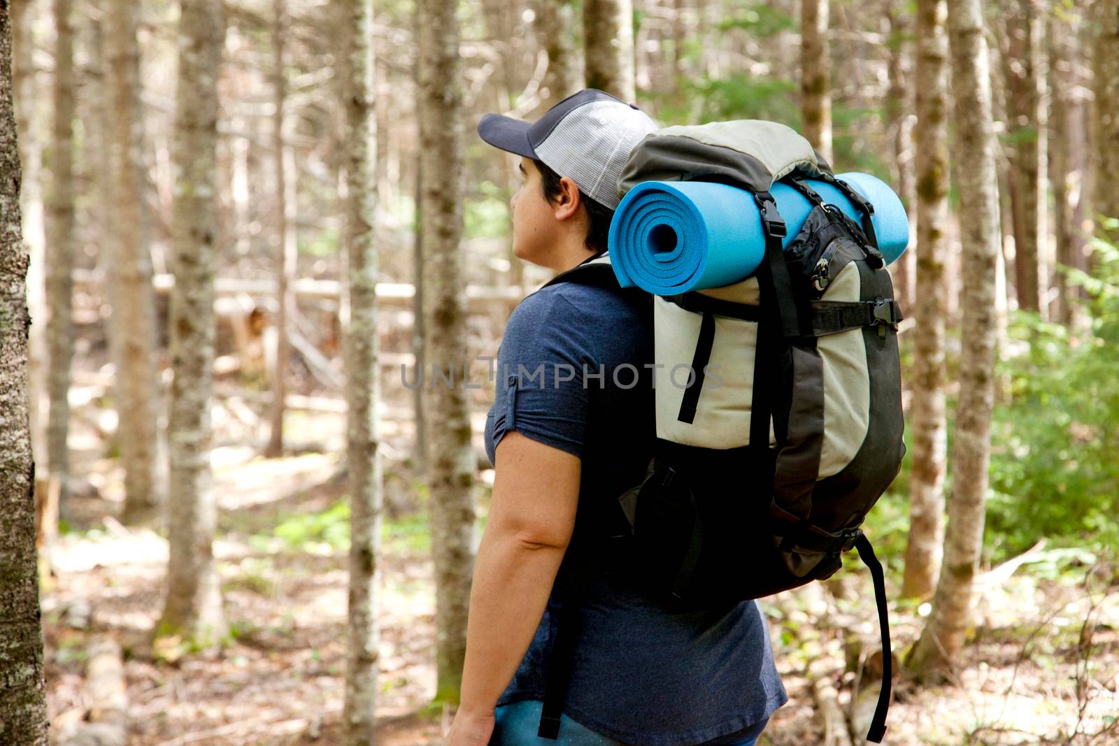 Backpacker in the woods  by rustycanuck