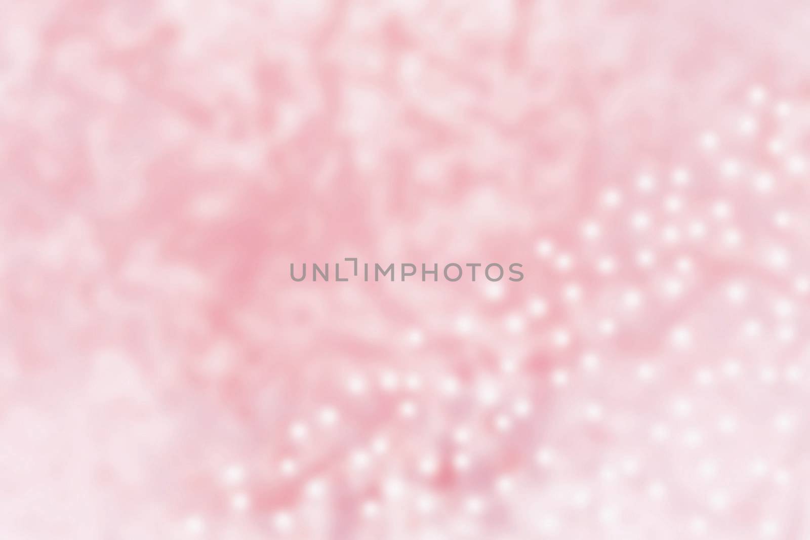 Pink and white lit swirling texture or pattern 