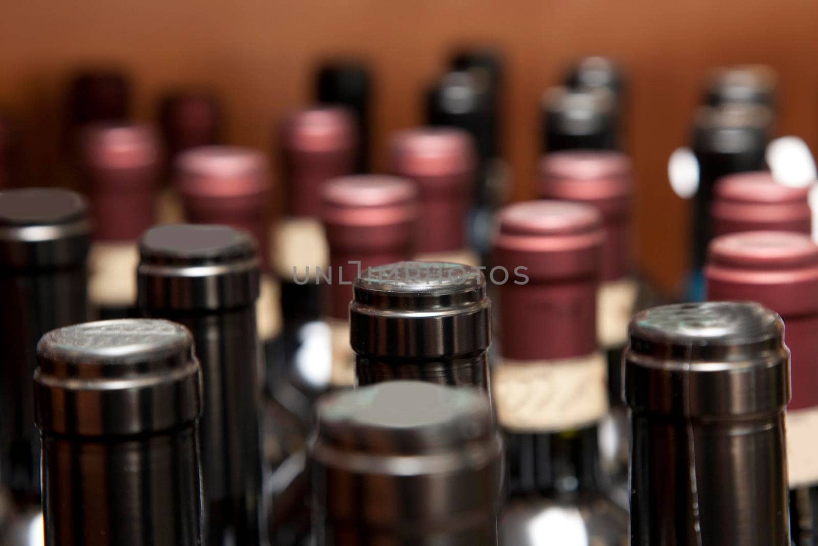 Tops of wine bottles by rustycanuck