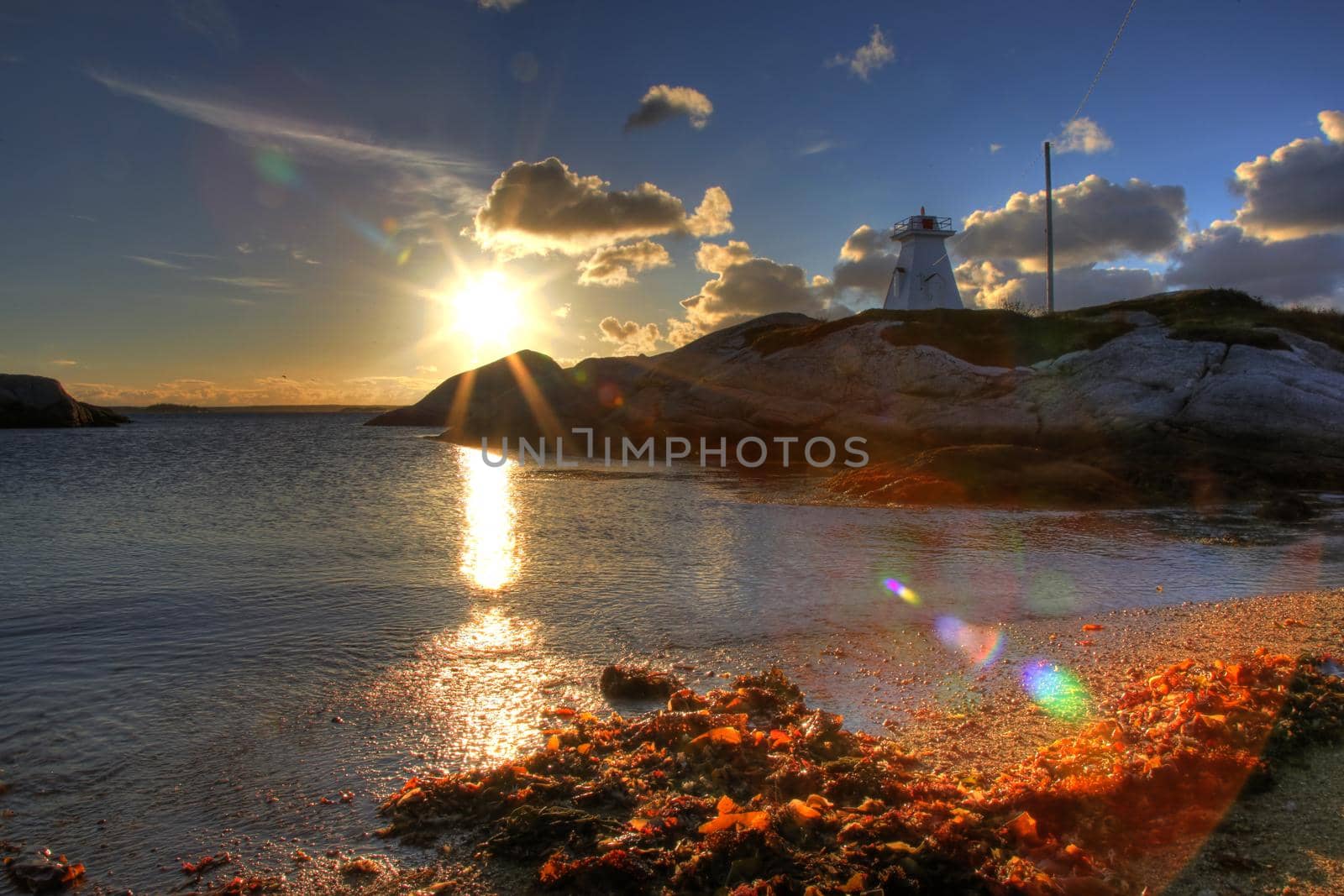 Sandy Cove or Terrence Bay area near Prospect in Halifax, with lighthouse at sunrise