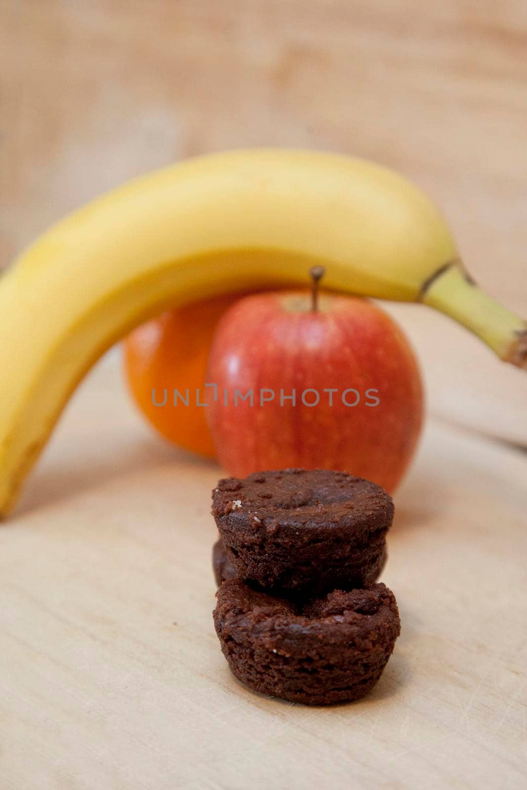 Making the choice between a stack of small brownies or some delicious whole fruit 