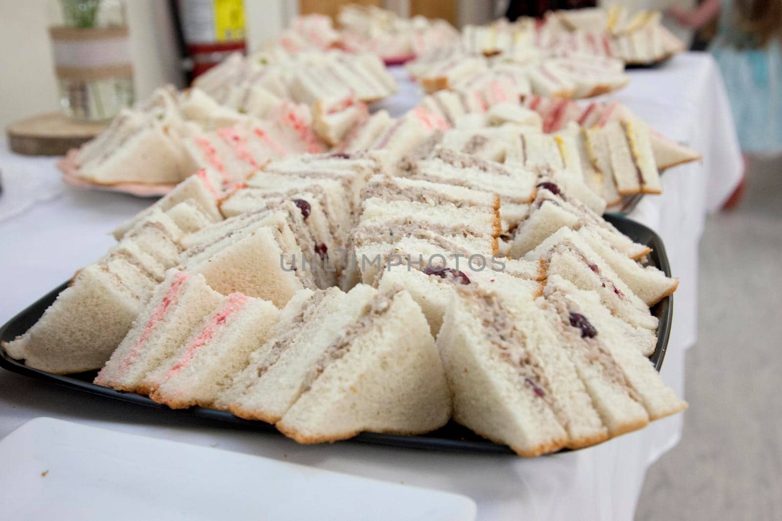 Delicious assortment of finger sandwiches at a function or party 