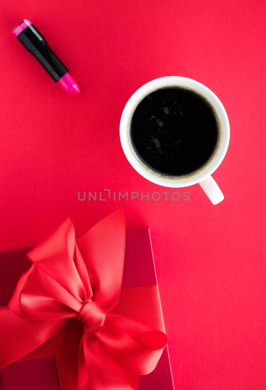 Romantic celebration, lifestyle and birthday present concept - Luxury beauty gift box and coffee on red, flatlay