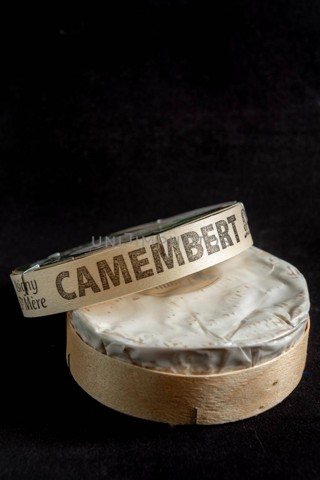 Andorra, La Vella, Andorra : 2021 April 30 : Camembert cheese in background black in studio.