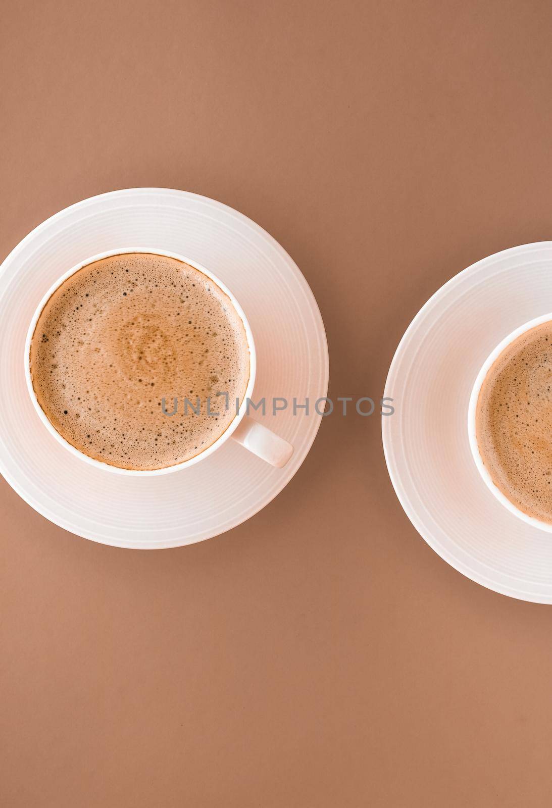 Cup of hot coffee as breakfast drink, flatlay cups on beige background by Anneleven