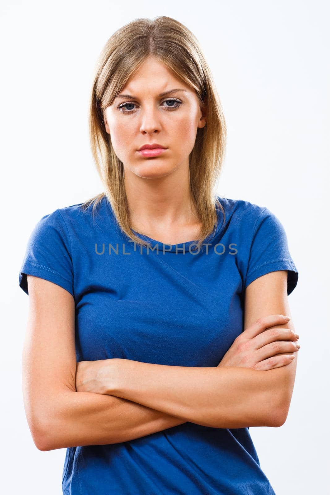 Sad young woman isolated on white background