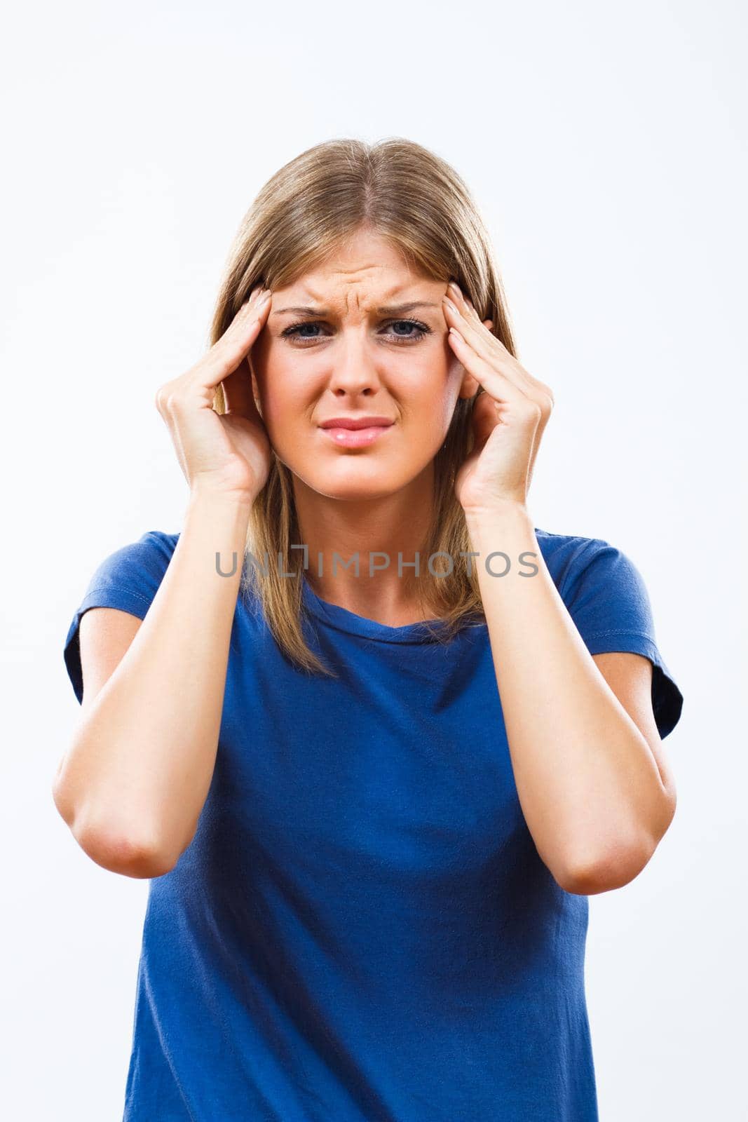 Young woman is having a headache.