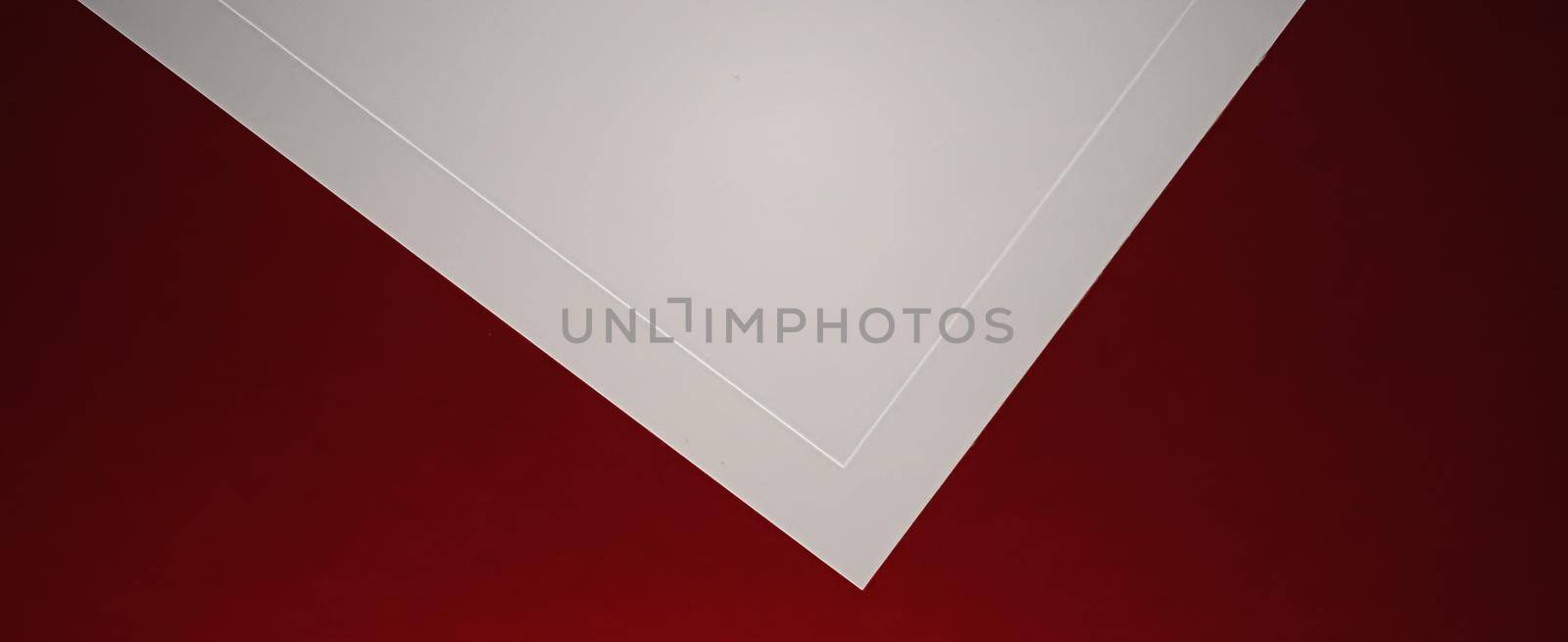 Blank A4 paper, white on red background as office stationery flatlay, luxury branding flat lay and brand identity design for mockup.