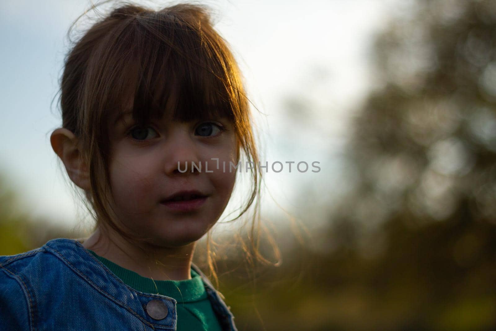A Cute Baby Girl In A Park On A Sunny Day by AlbertoPascual