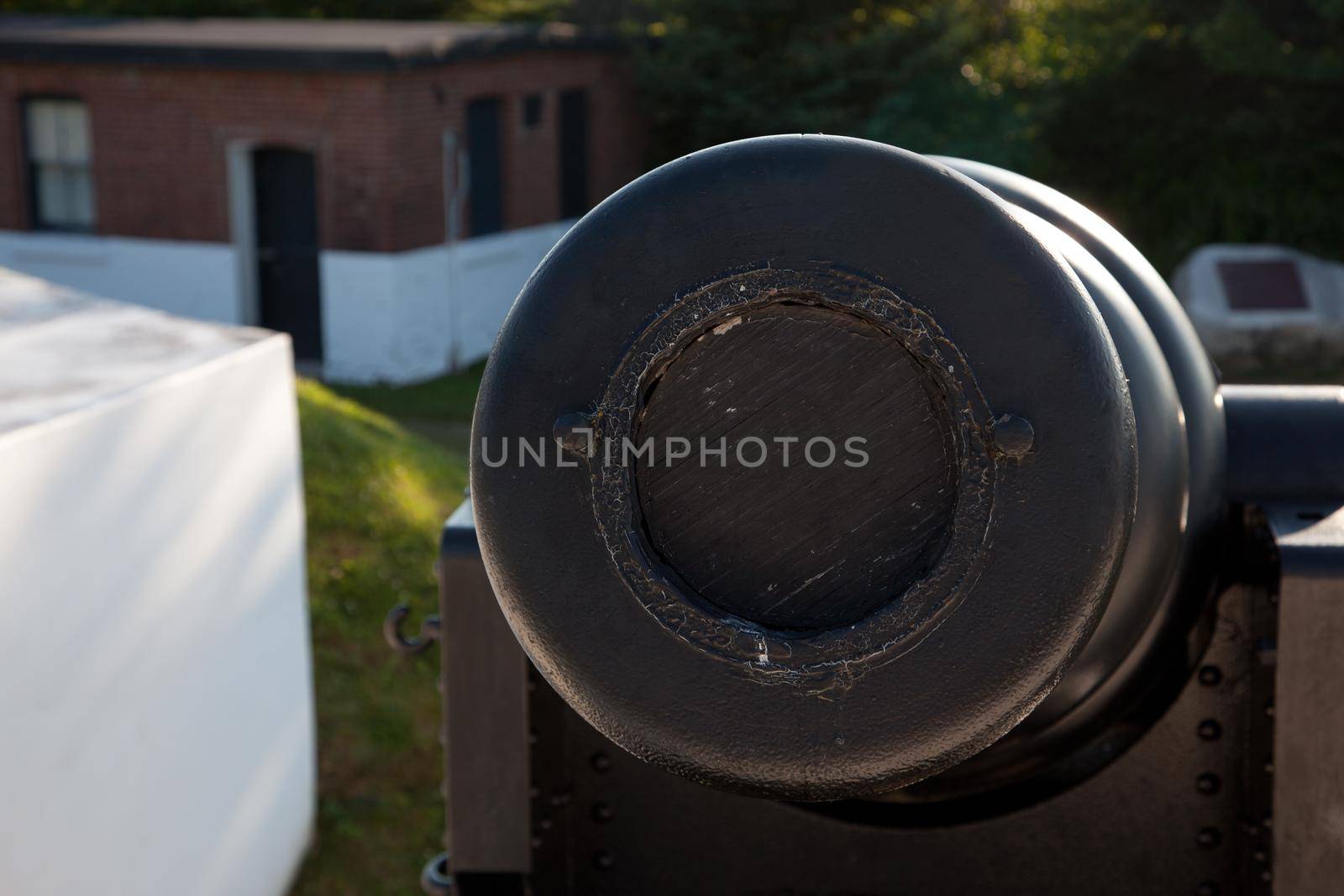 an old cannon has been boarded up and closed after the war