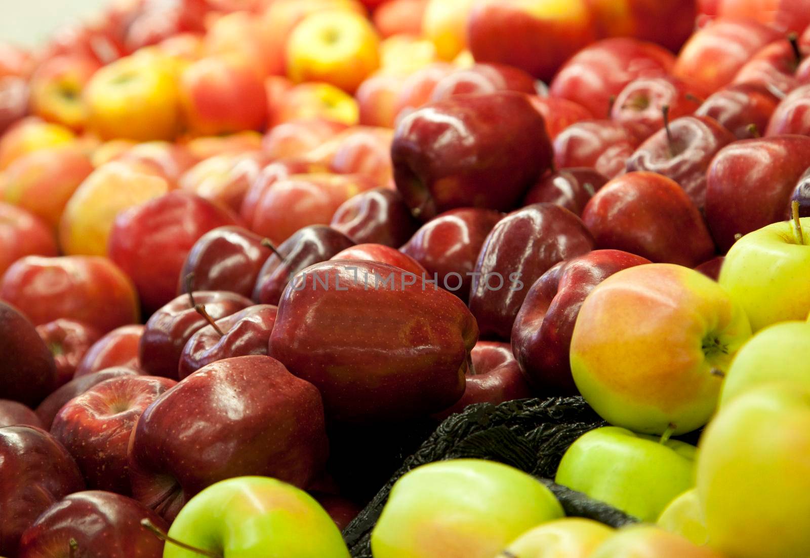  focus on beautiful fresh red apples at a market stand