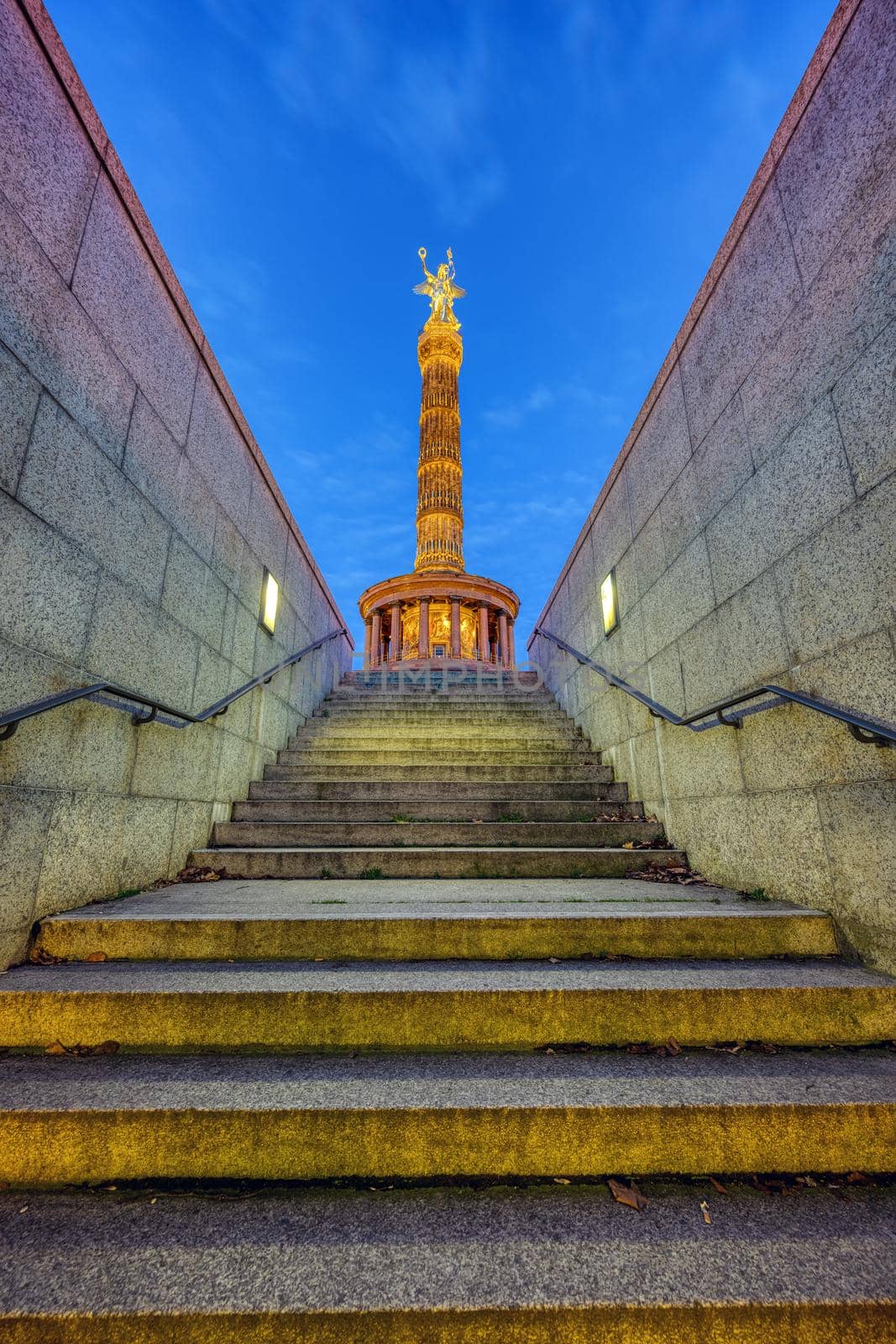 The Victory Column in Berlin at night seen from an underpass