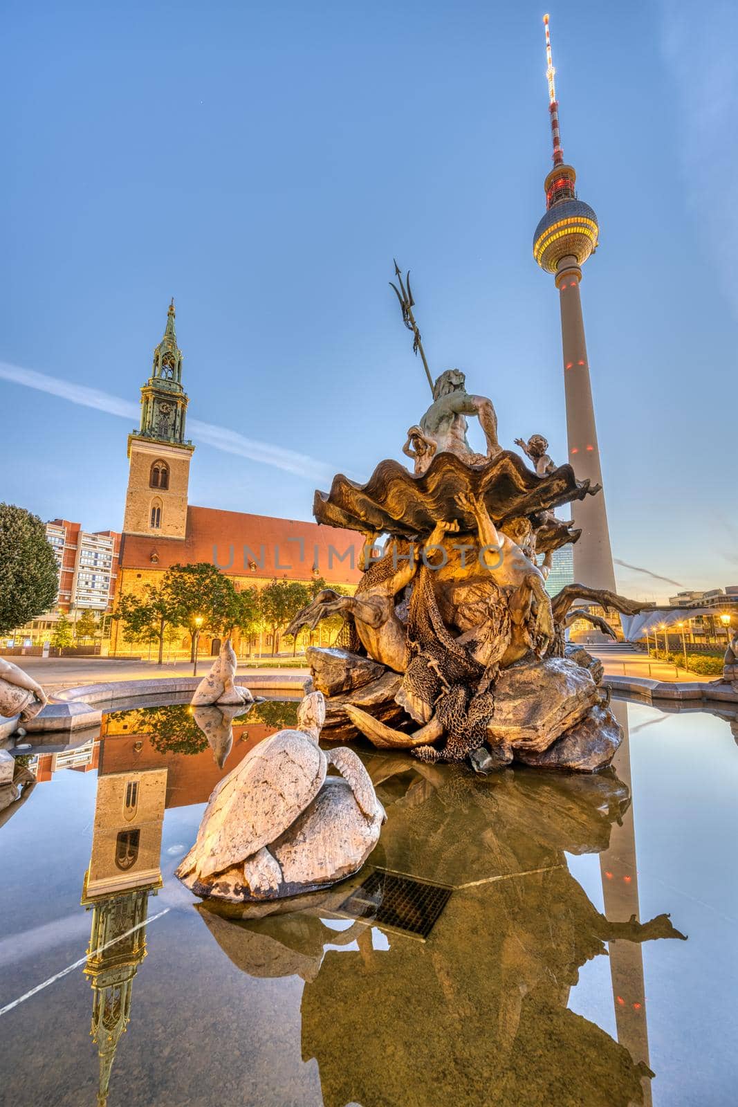 The Neptune Fountain at Alexanderplatz in Berlin by elxeneize