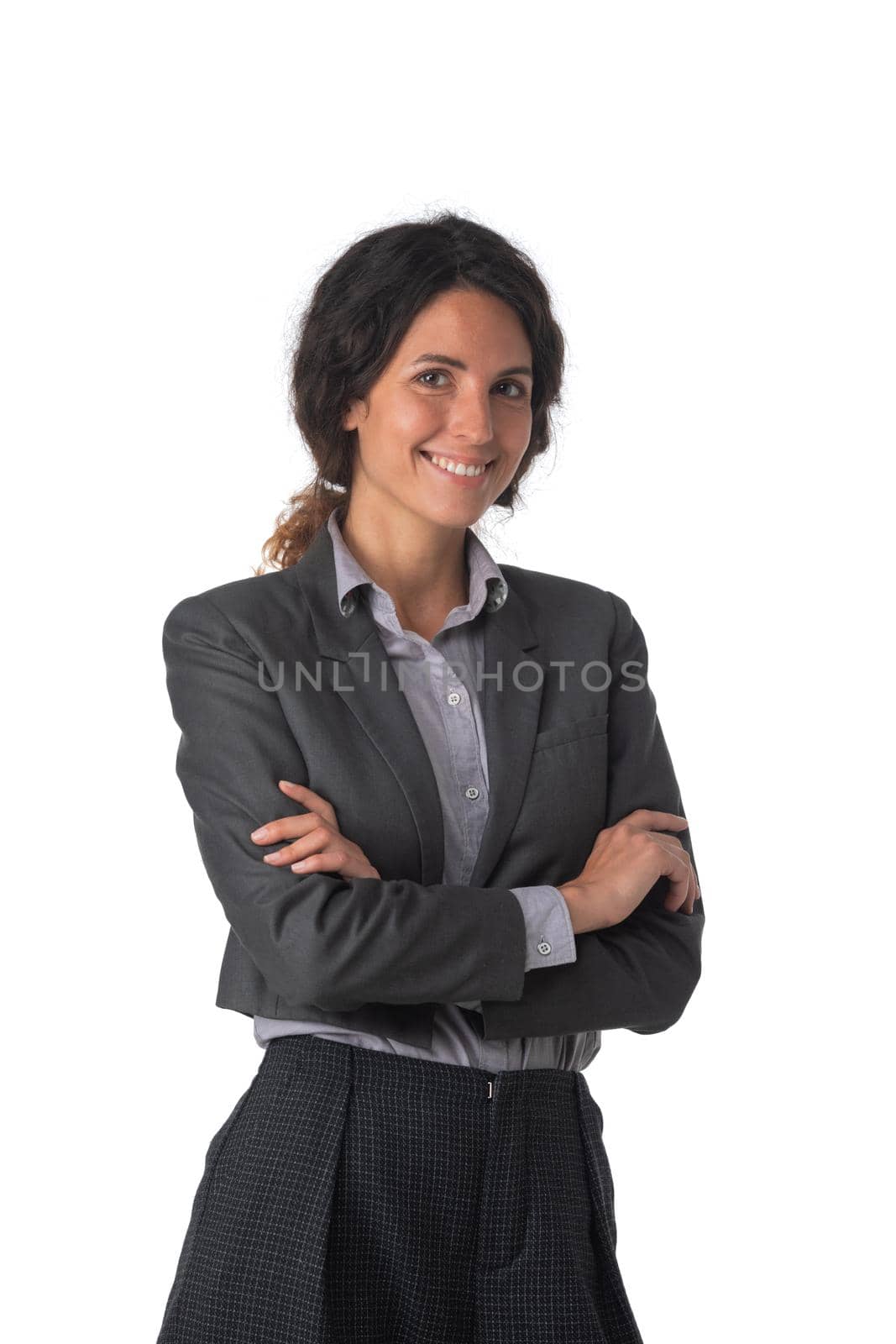 Portrait of young business woman with arms crossed studio isolated on white background