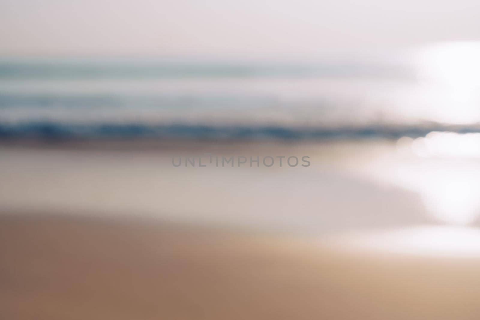 Blur tropical nature clean beach sunset sky time with sun light background.