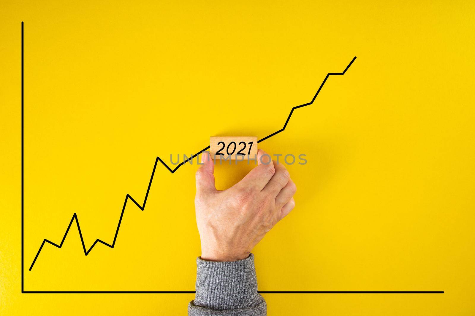 Statistical financial graph predicting an economic growth in 2021 after the 2020 global coronavirus pandemic.