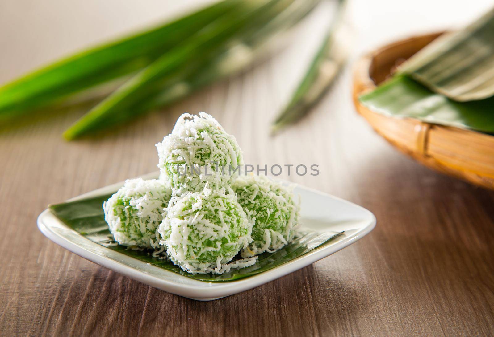 Onde onde is a traditional Malay snack made of rice ball filled with brown sugar, coated in grated coconut. by tehcheesiong