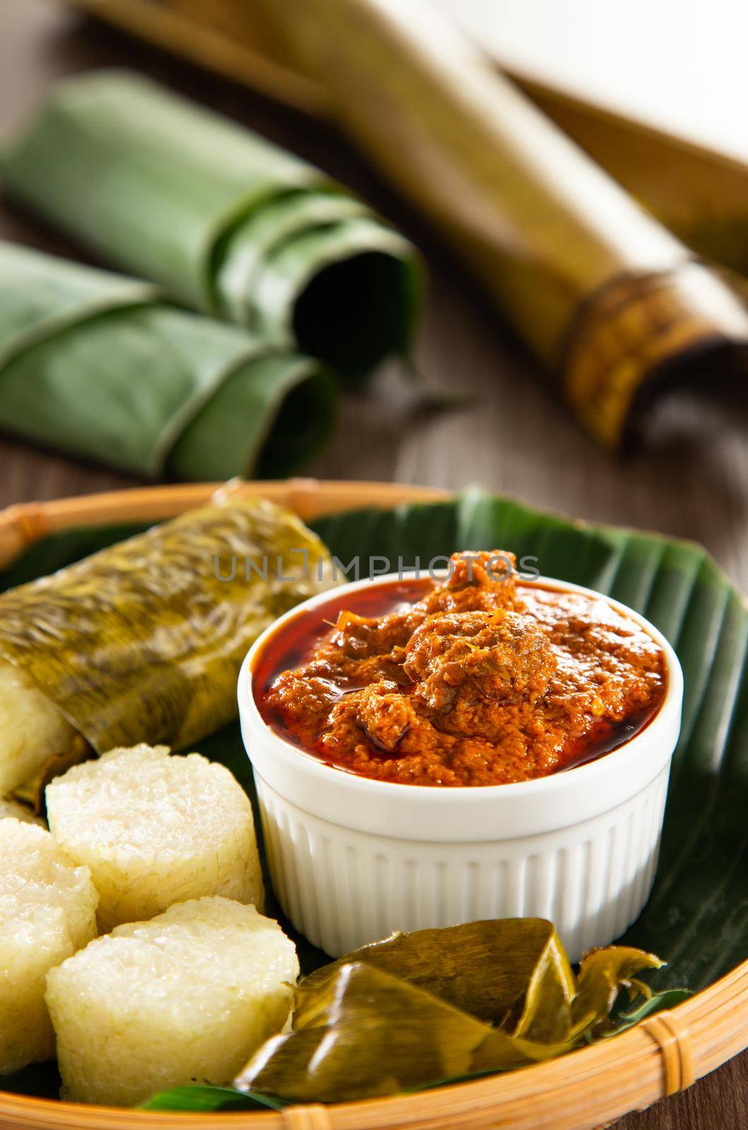 Lemang. Glutinous rice is wrapped with lerek or banana leaf encased in bamboo culm and cooked in open fire.