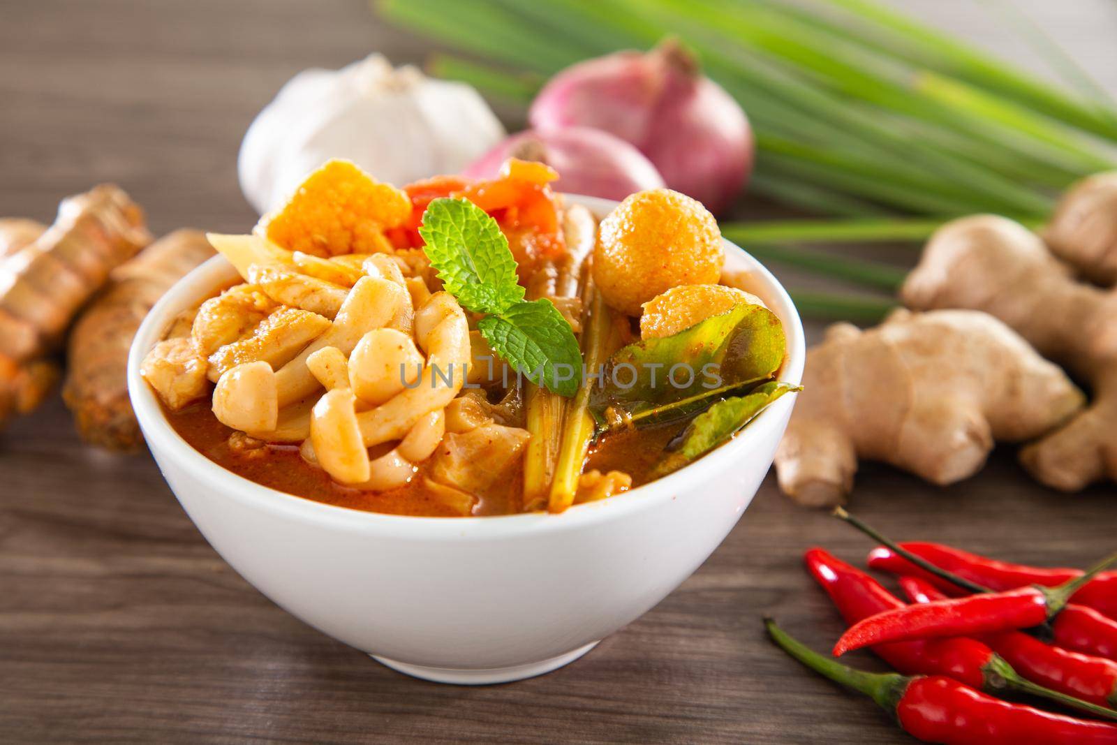 Tom yam kong or Tom yam is a spicy clear soup typical in Thailand and No.1 Thai Dish Cuisine. Thai food. by tehcheesiong