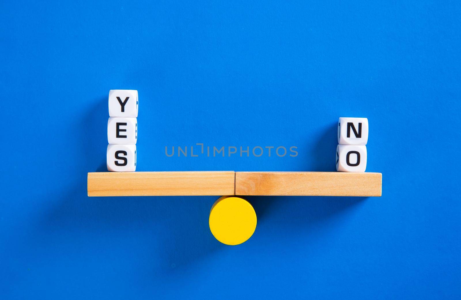 Yes vs No. Choice concept. Balance scales on blue background.  by tehcheesiong