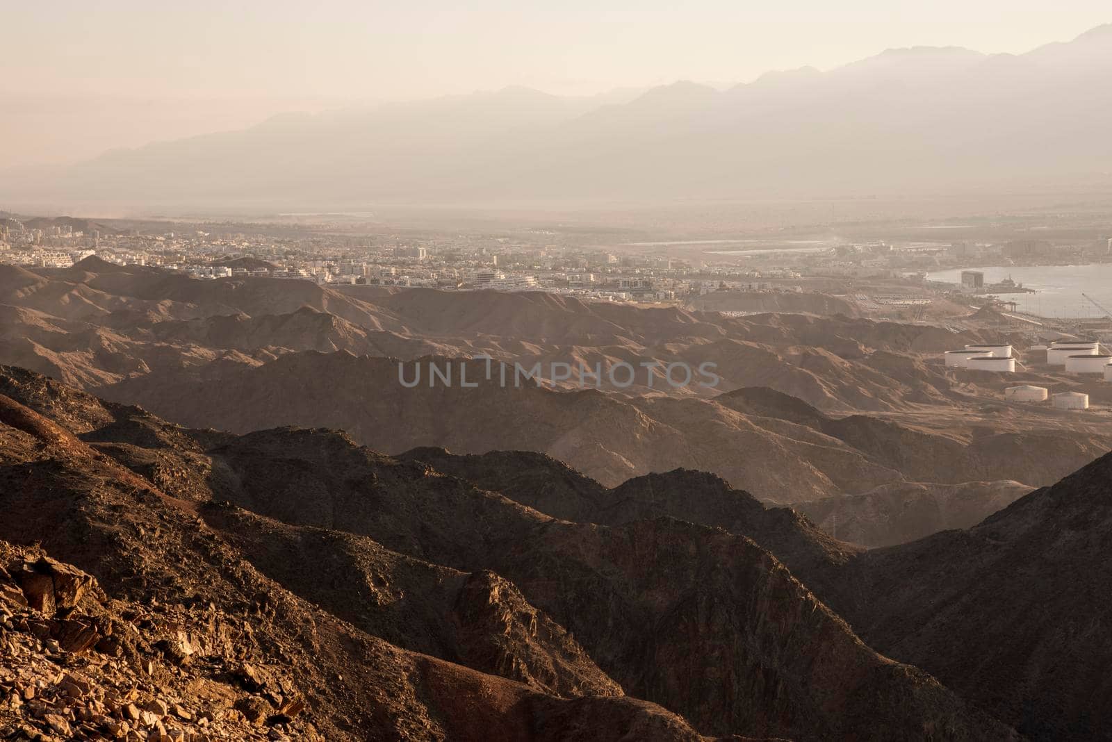 Arid desert mountains against the backdrop of the Red Sea. Shlomo mountain, Eilat Israel. Morning Daylight . High quality photo