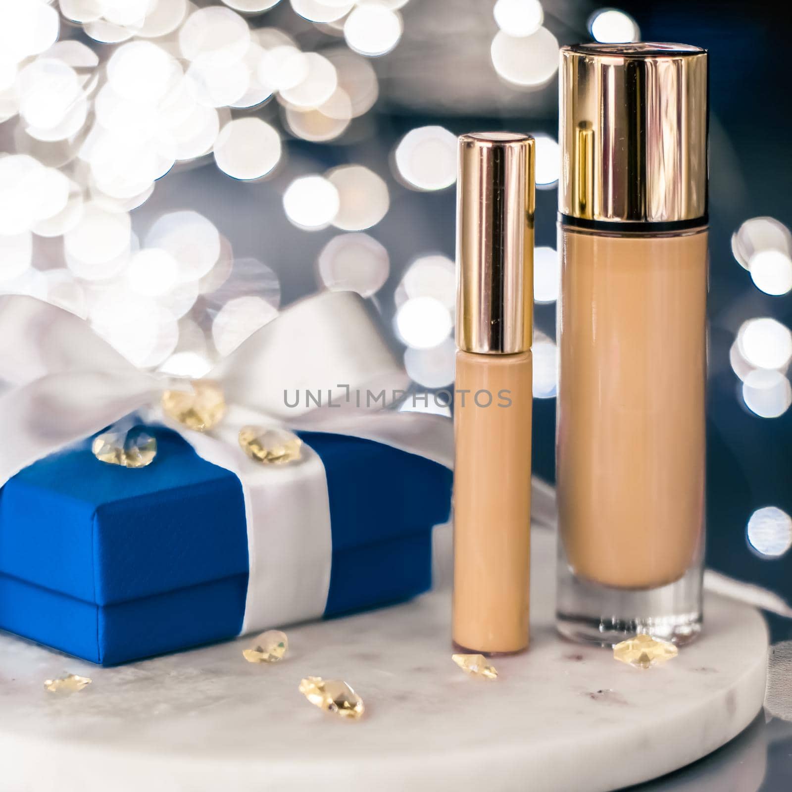 Holiday make-up foundation base, concealer and blue gift box, luxury cosmetics present and blank label products for beauty brand design by Anneleven