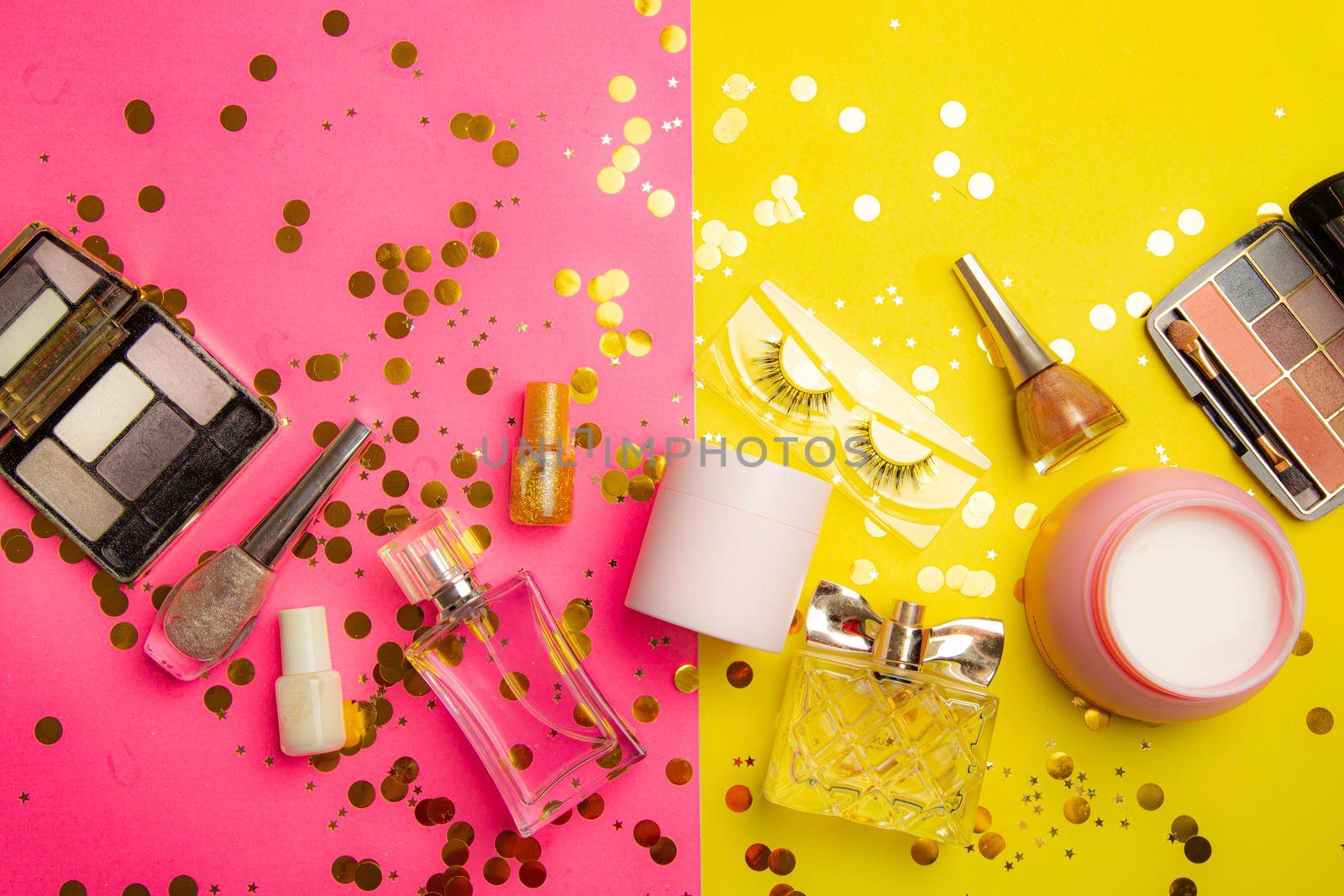 Bright makeup layout . Fashion industry. Cosmetology. Makeup Glitter Bright background