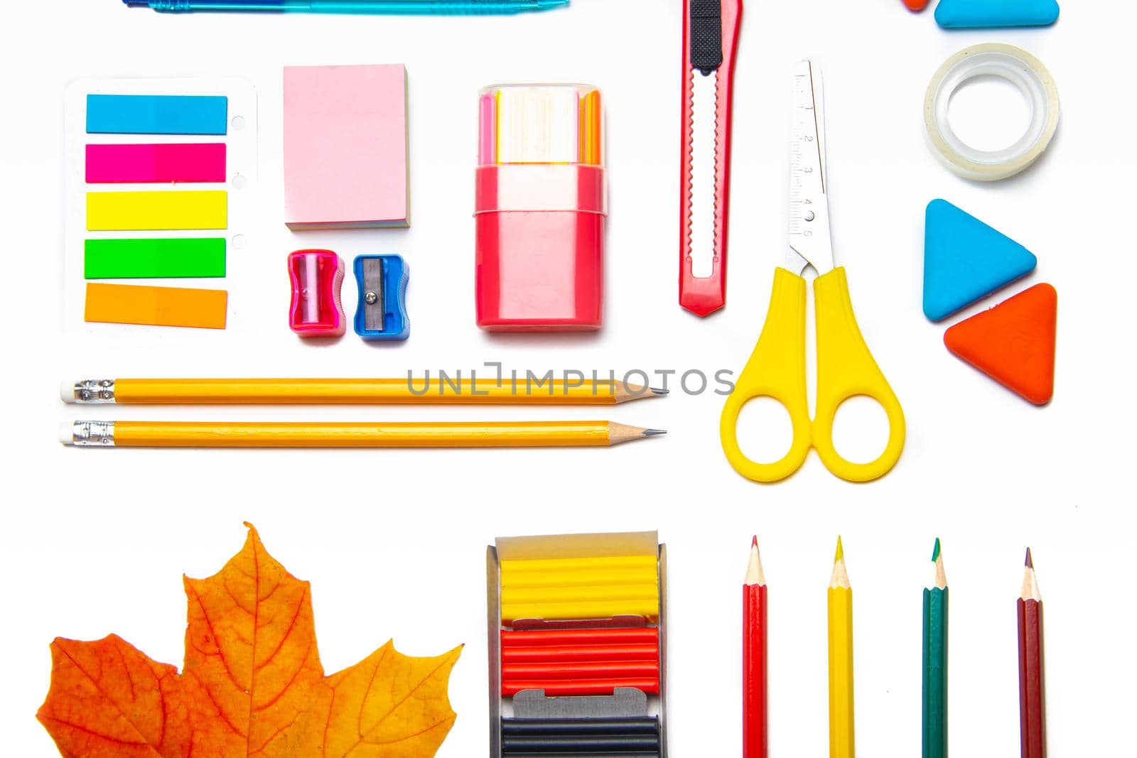 Office supplies layout on a white background copy space . School supplies. Colored stationery. Isolated background. Article about preparing for the school year. Article about choosing office supplies. Copy space