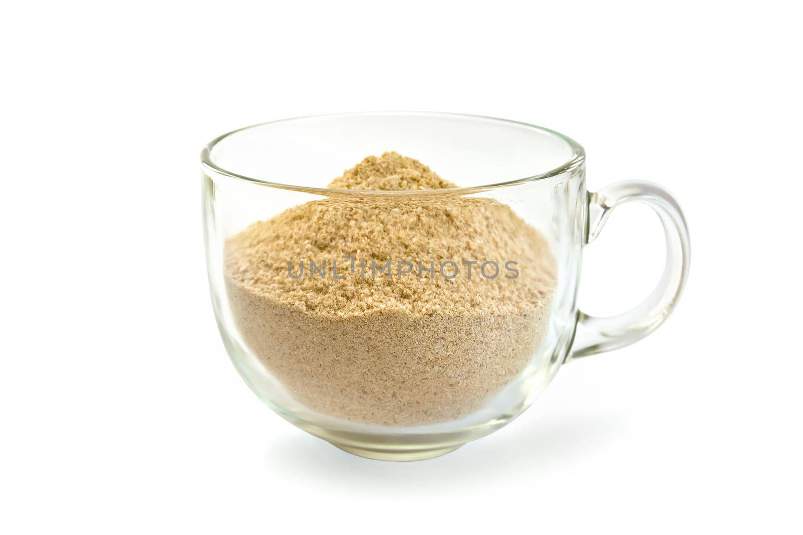Flour sesame, cedar or oatmeal in a glass cup isolated on white background
