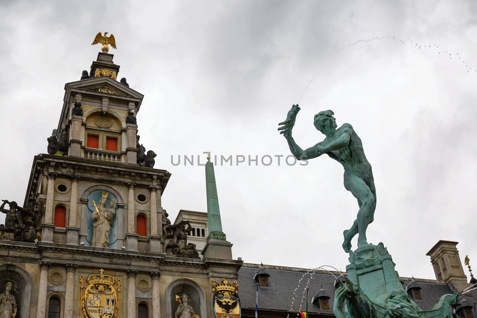 Brabo fountain and traditional flemish architecture at Grote Markt square in Antwerp in Belgium.