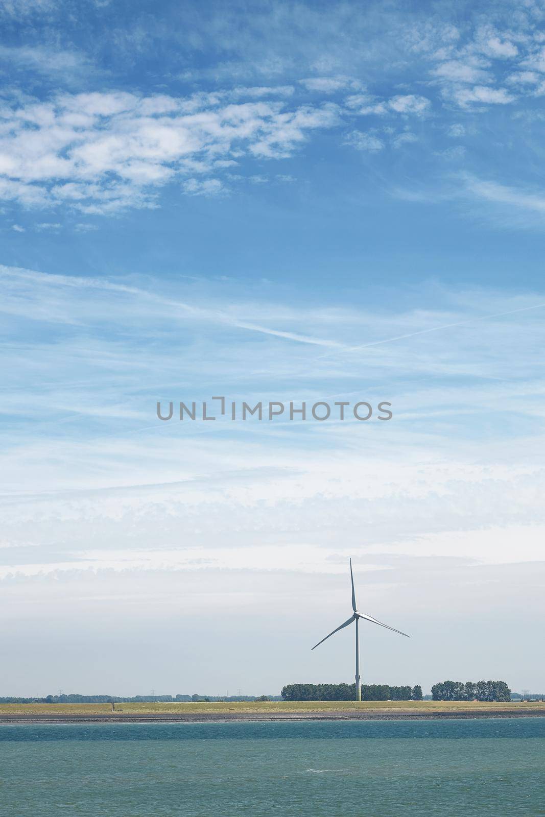 Windmill in Belgium for production of green energy. by wondry