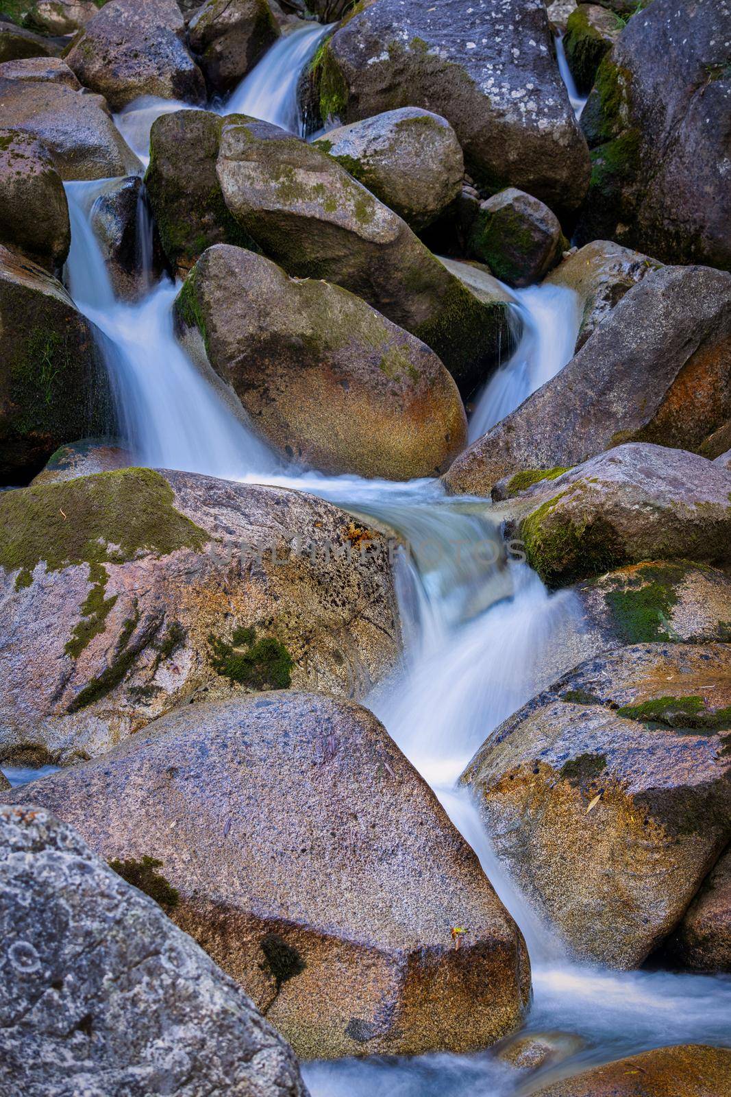 Long exposure picture from a small brock with nice rocks by Digoarpi