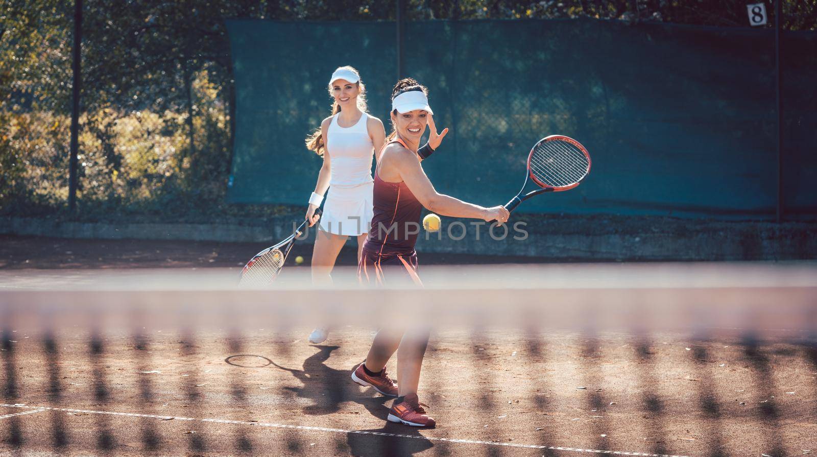 Woman in a tennis double by Kzenon