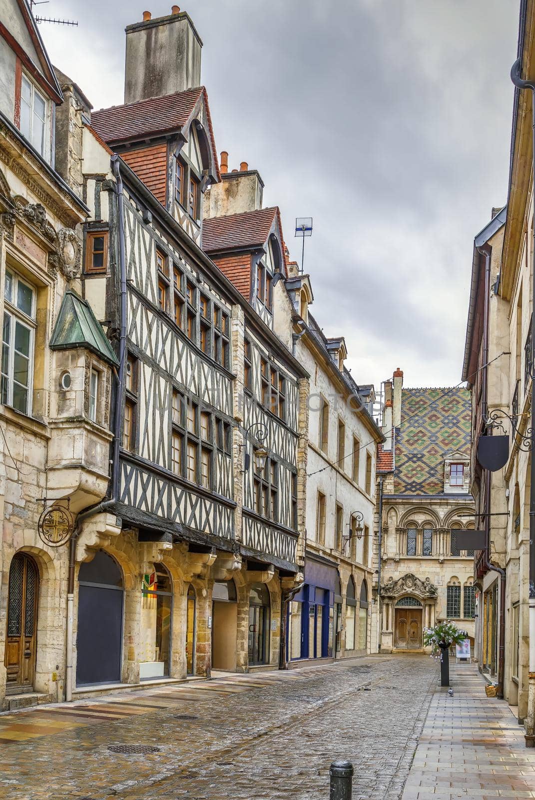 Street with historical half-timbered houses in Dijon, France
