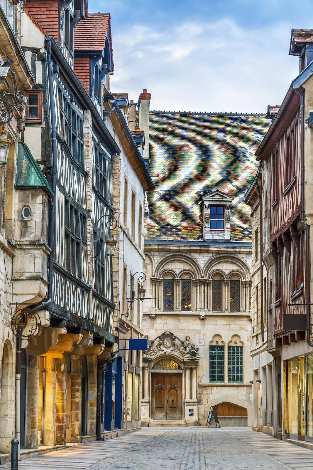 Street with historical half-timbered houses in Dijon, France