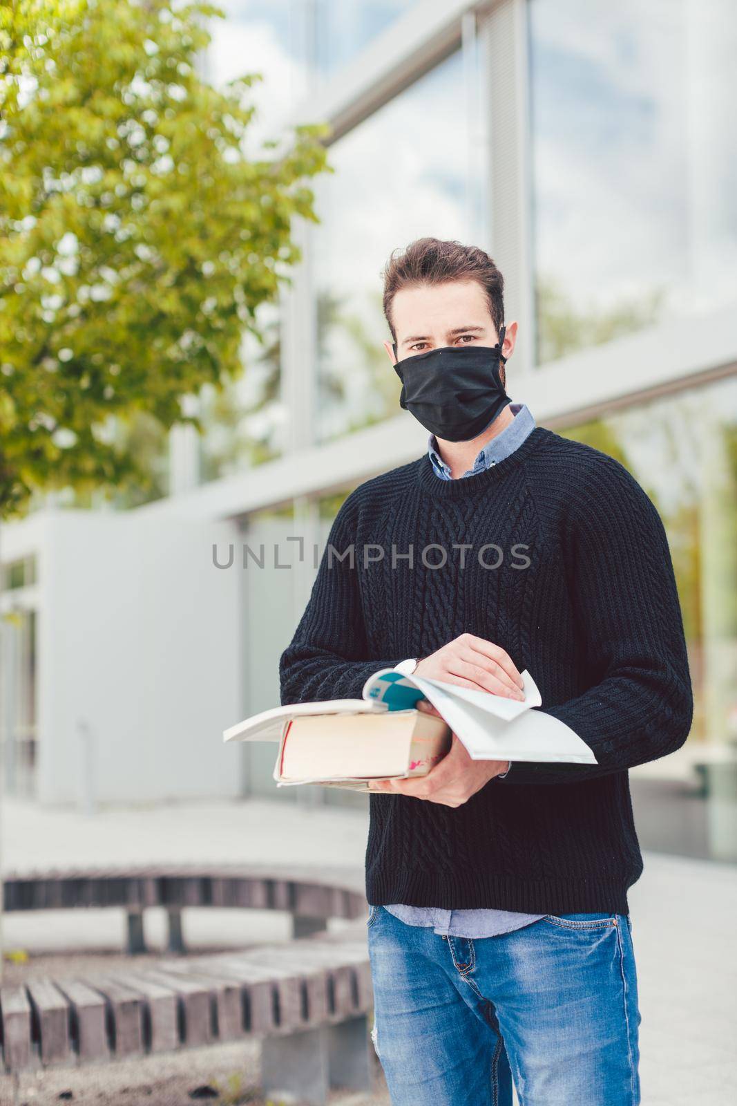Student wearing mask during covid-19 cannot enter closed university building