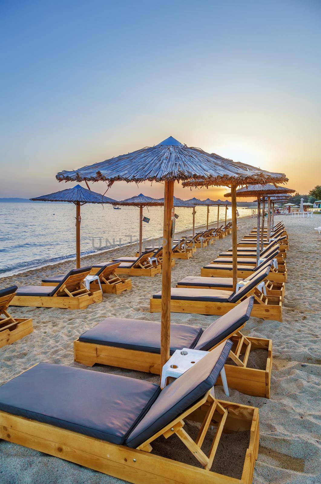 Thatched umbrella on the Toroni beach in Sithonia peninsula, Chalkidiki, Greece