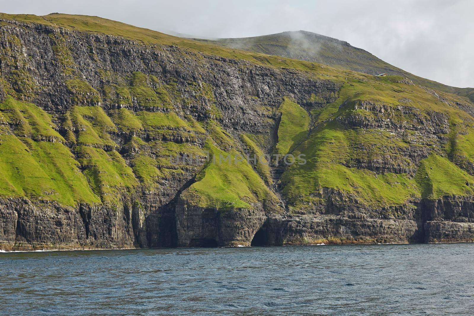 Wild and rocky coast of Faroe Islands, Denmark.